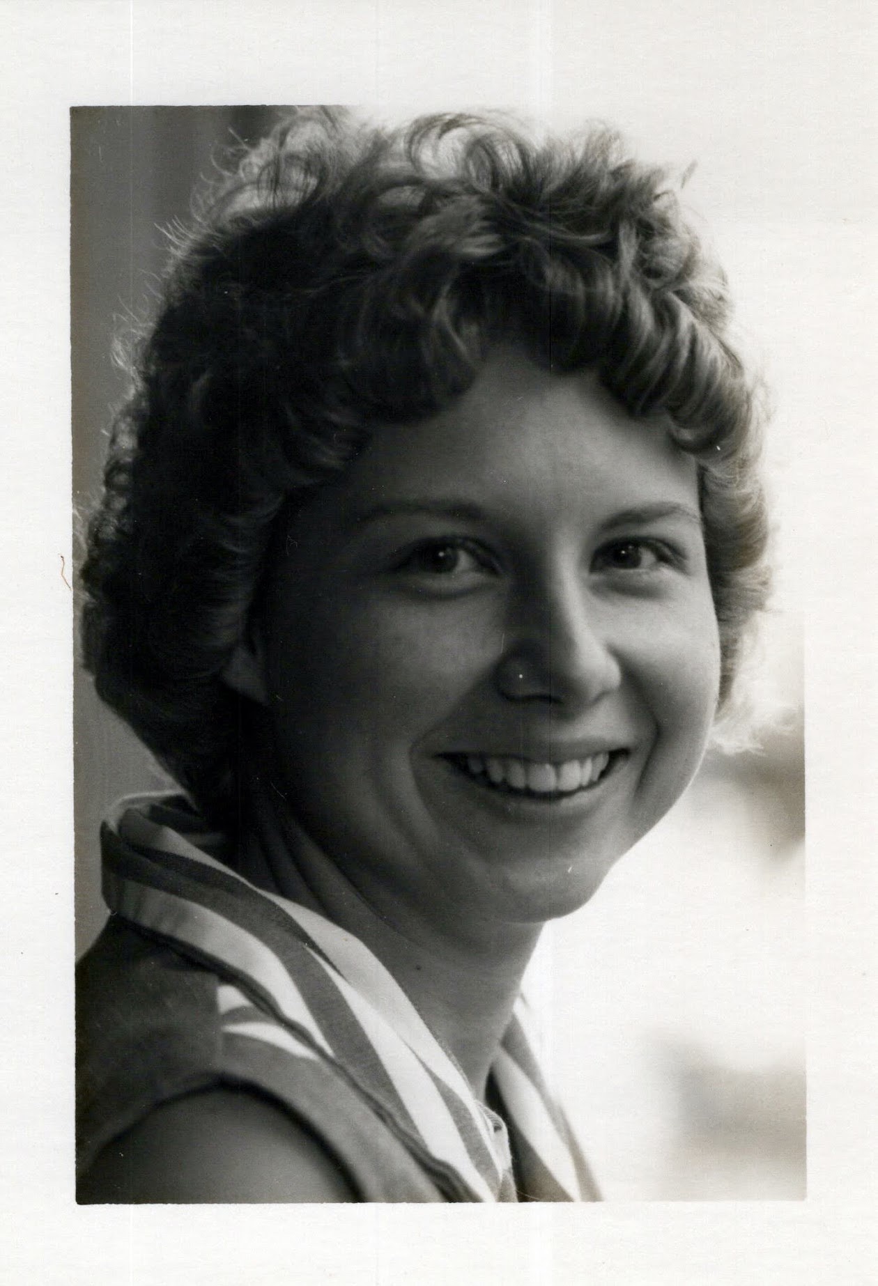 Betty smiling in a 1974 black-and-white portrait