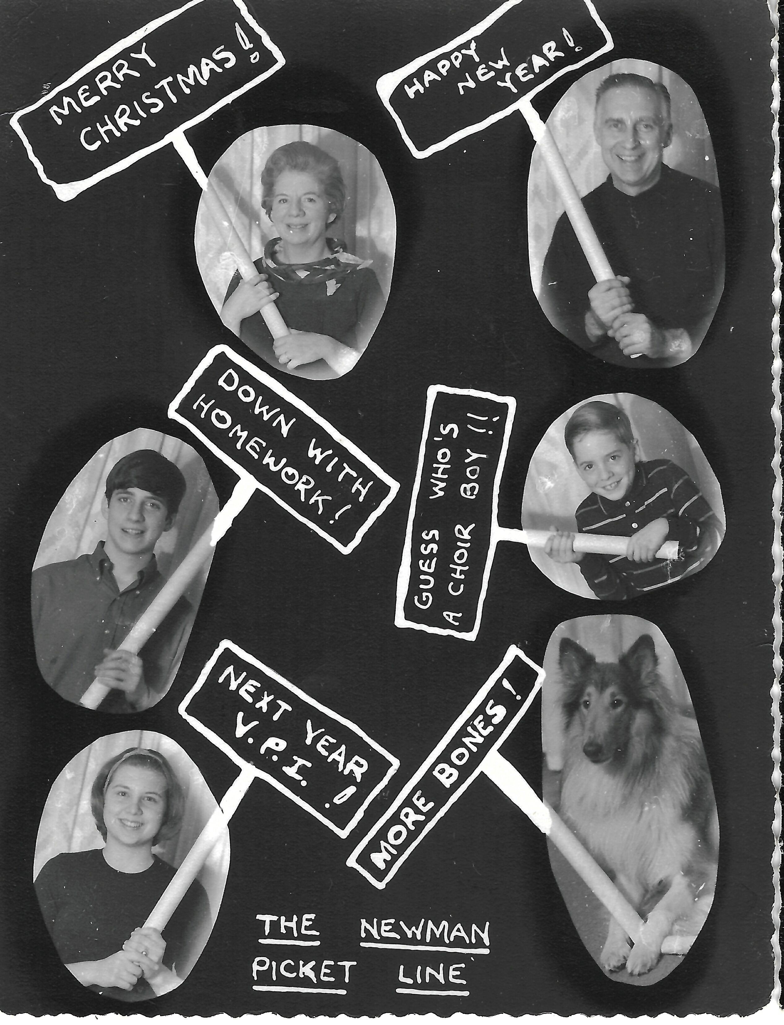 The Newman picket line. Family portraits and a dog carry Christmas, New Year and playful picket signs.
