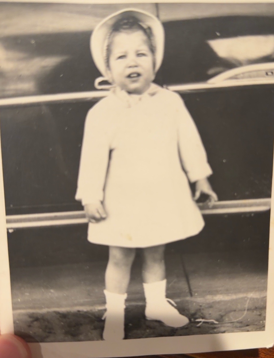 Young Betty beside a car; family tentatively places this photo near Las Cruces, New Mexico, about 1952.