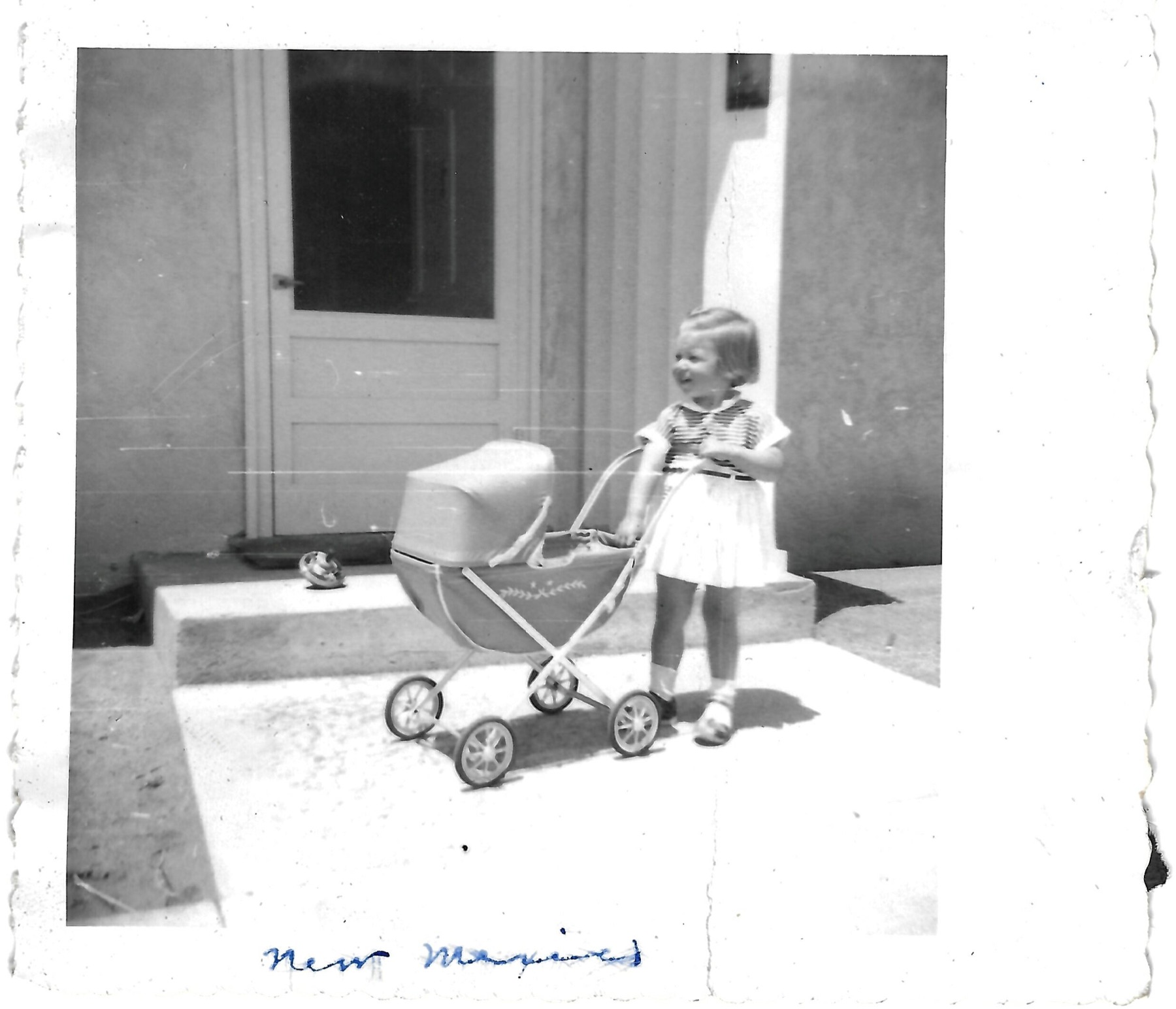 Betty with a toy pram in New Mexico