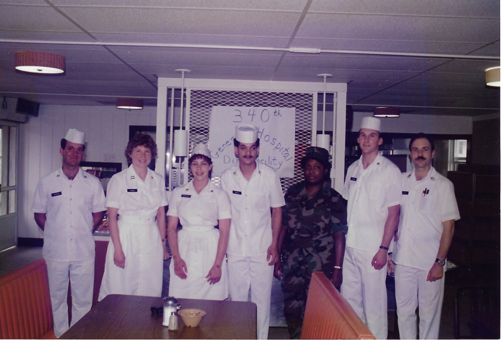 Betty with a uniformed hospital group; second from left