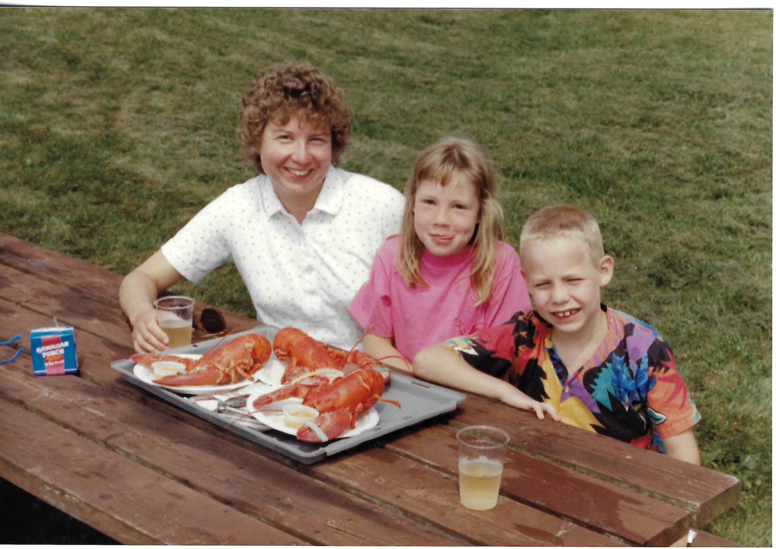 Betty, Eileen, and Dave at a picnic table