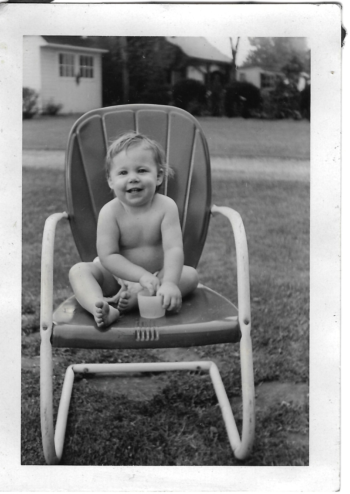 Betty seated in an outdoor chair