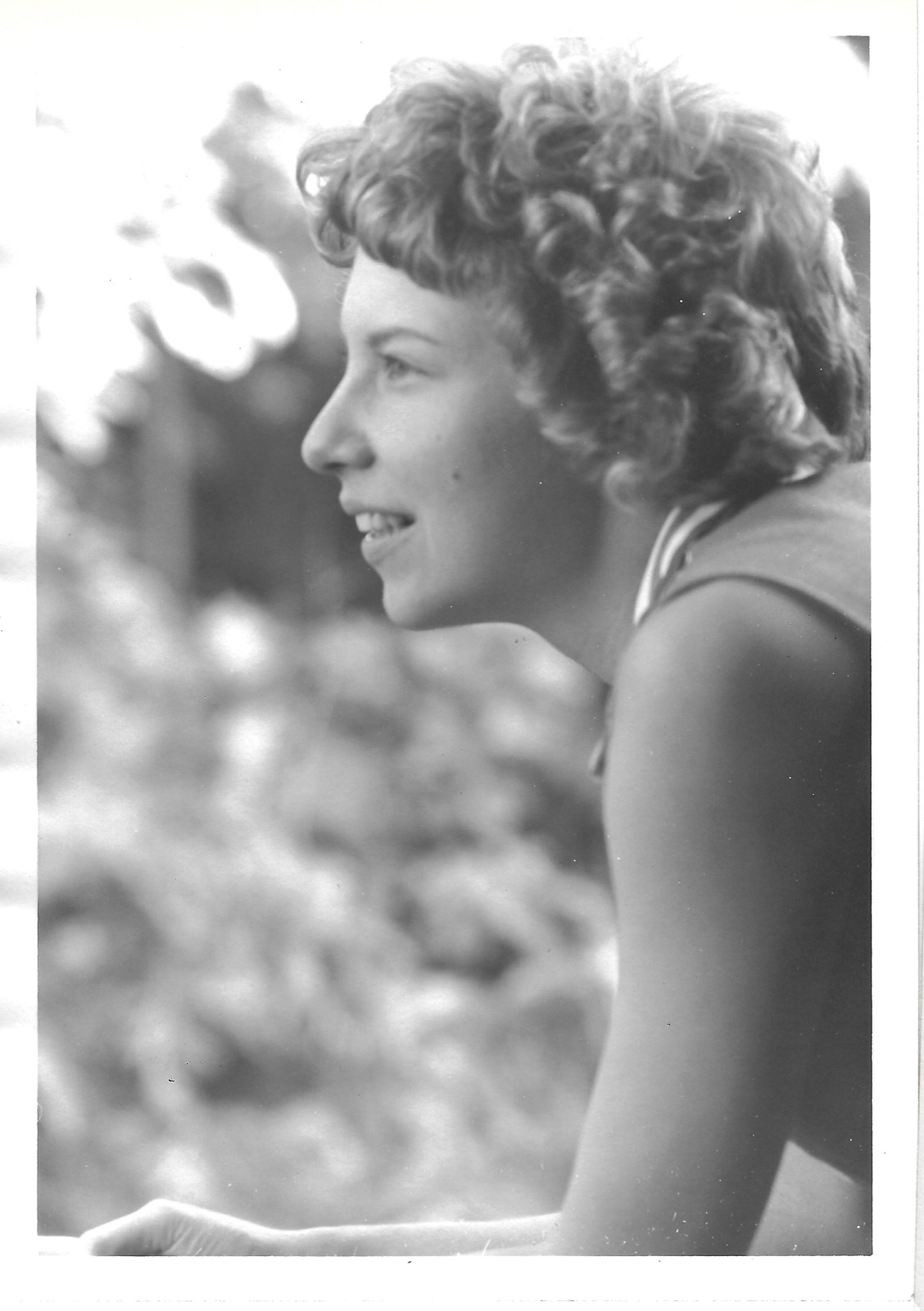 Betty outdoors in profile