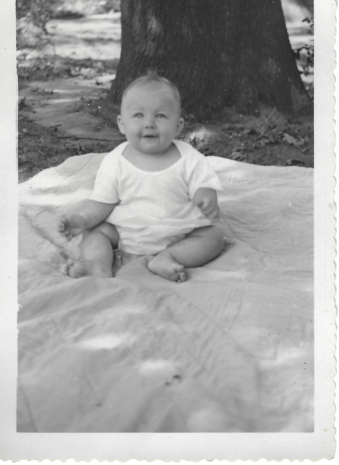 Baby Betty on a blanket outdoors