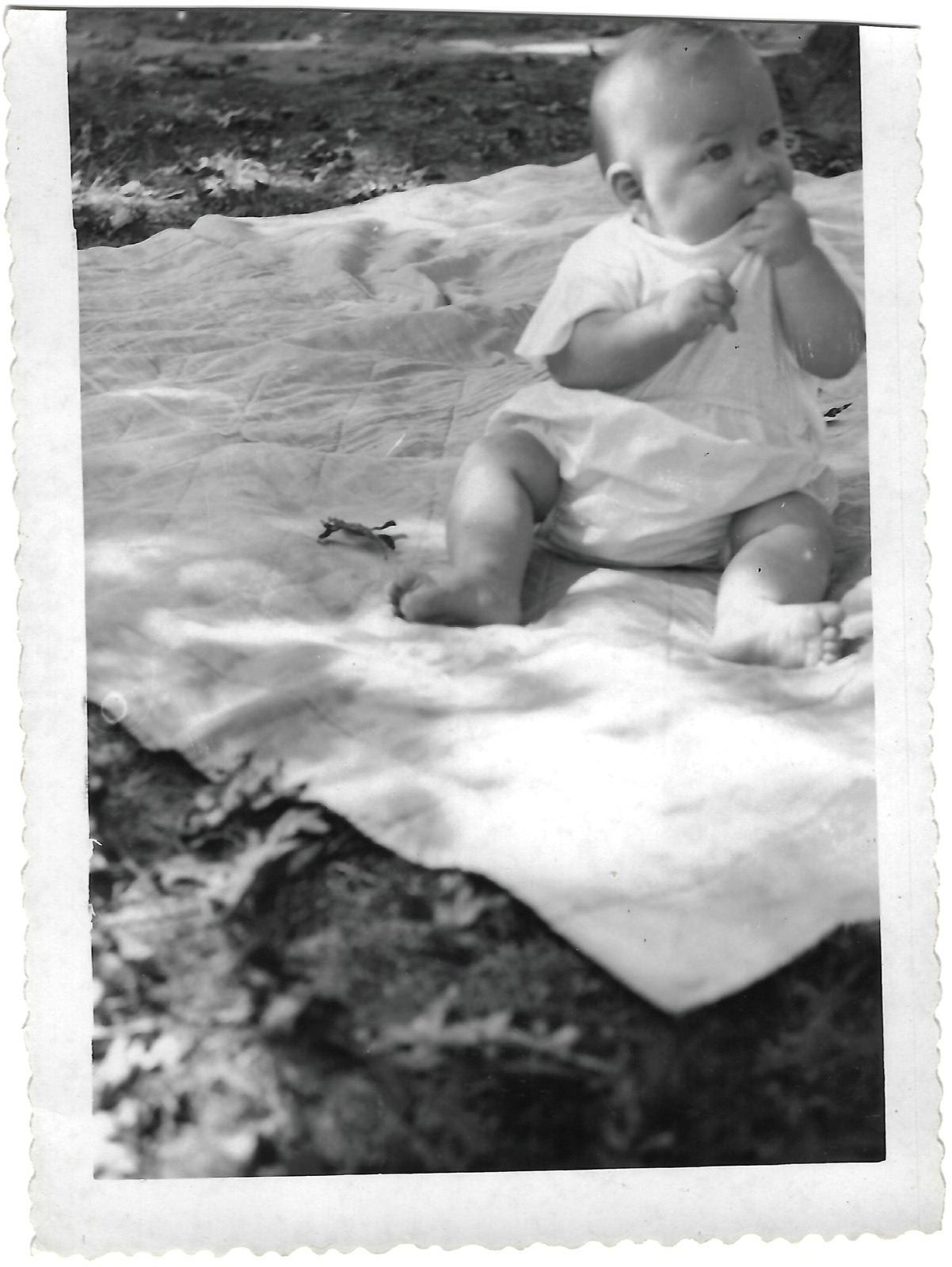 Baby Betty on an outdoor blanket