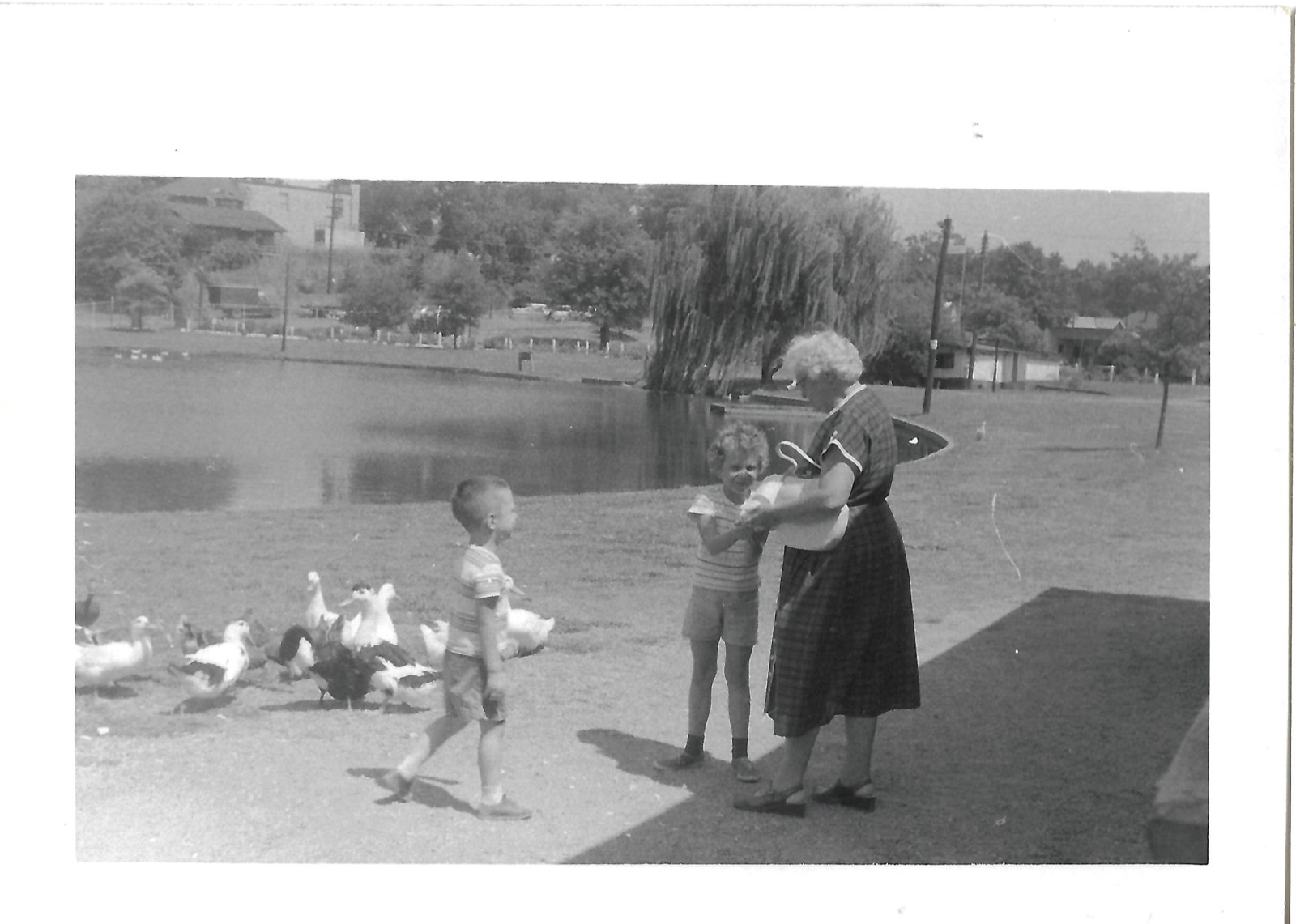 Betty and Bob with Bahee by a pond