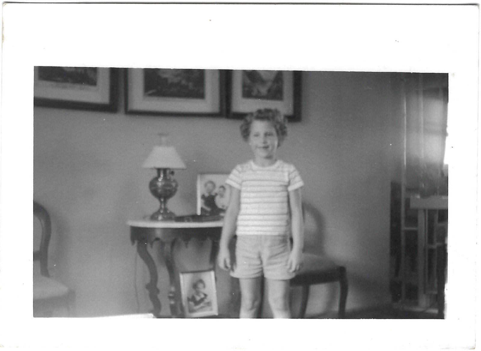 Young Betty standing indoors