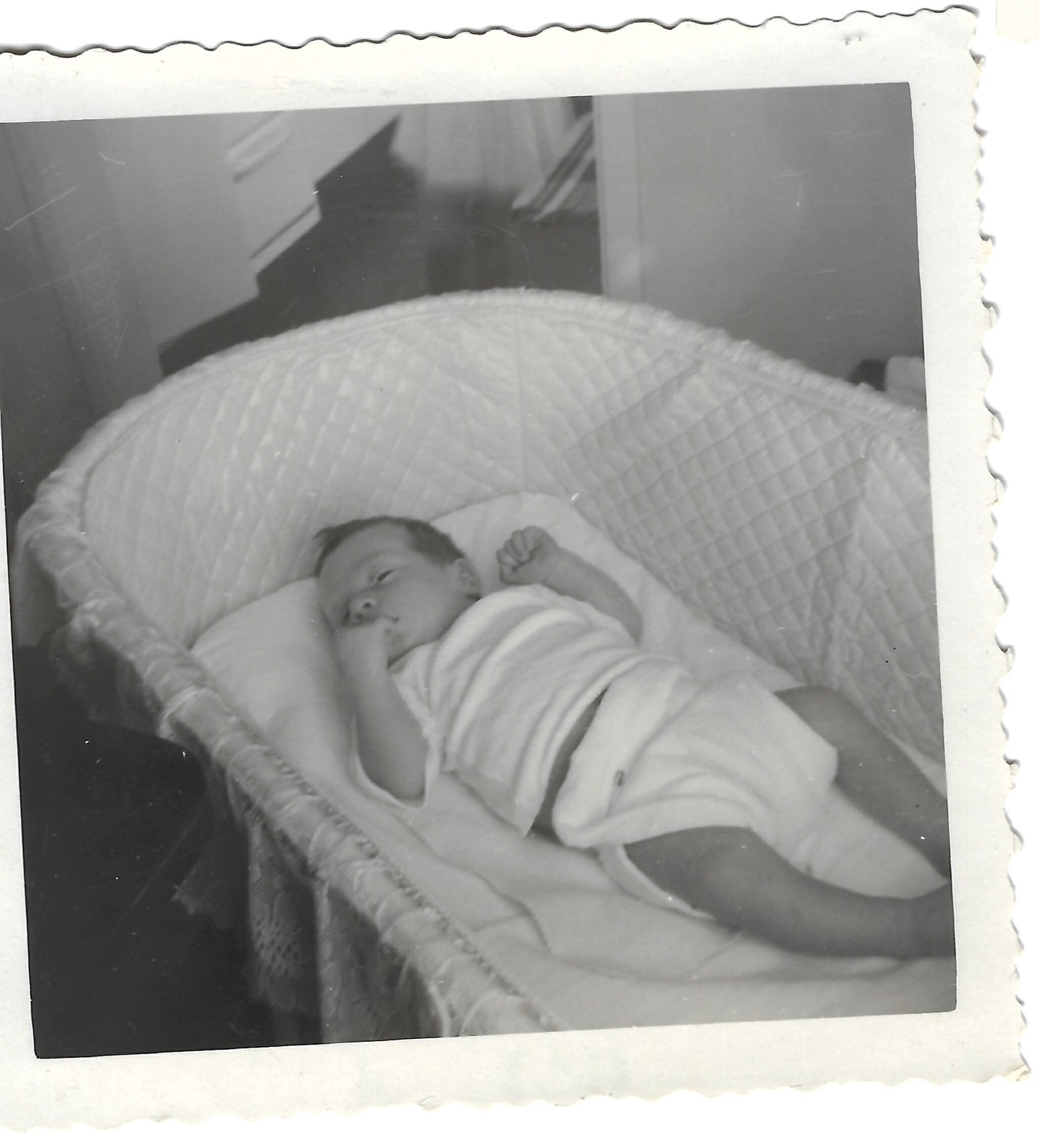 Baby Bob in a bassinet