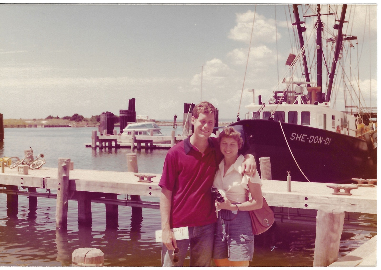 Betty and Dave by a harbor