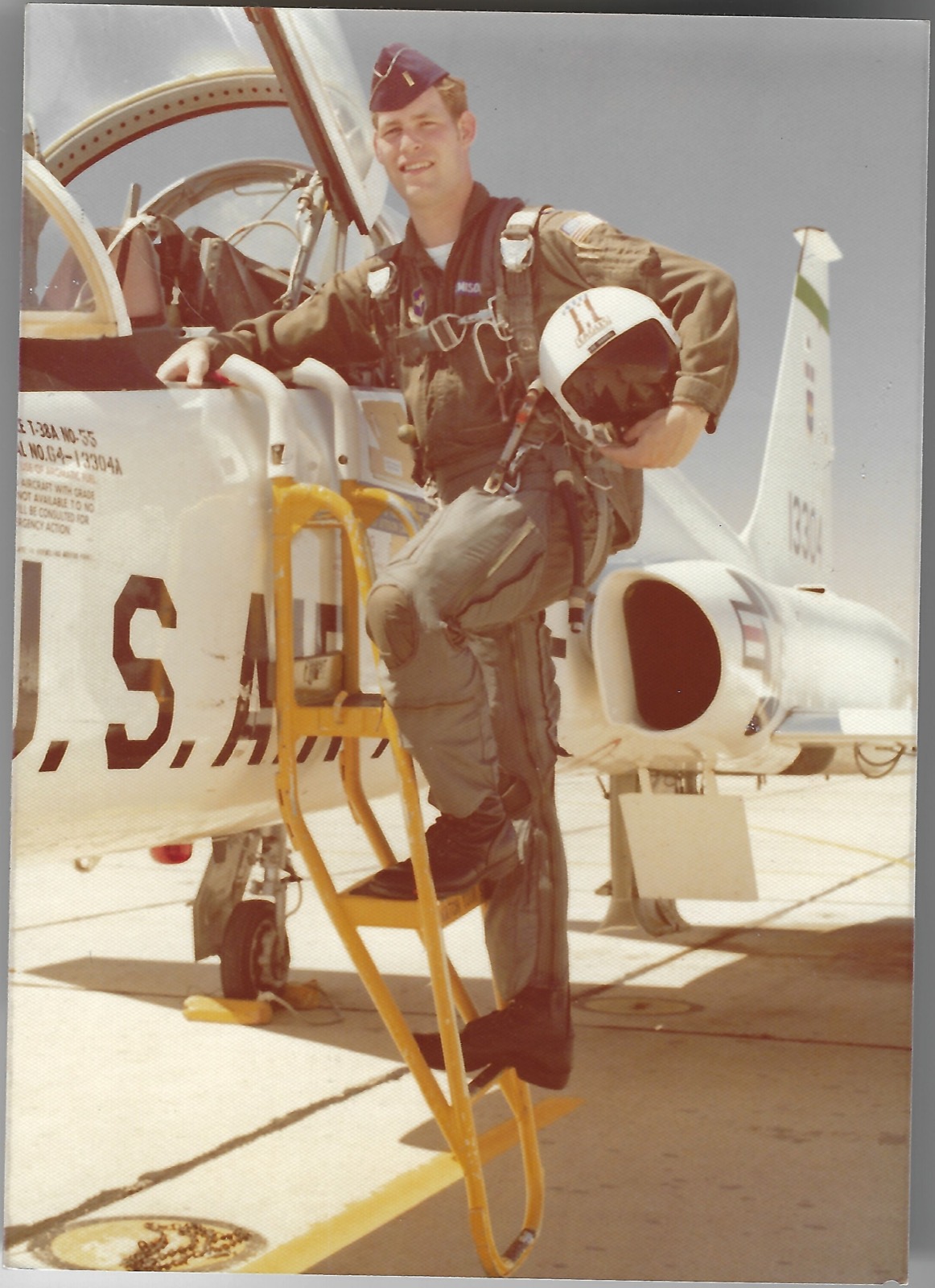 Dave beside a military aircraft