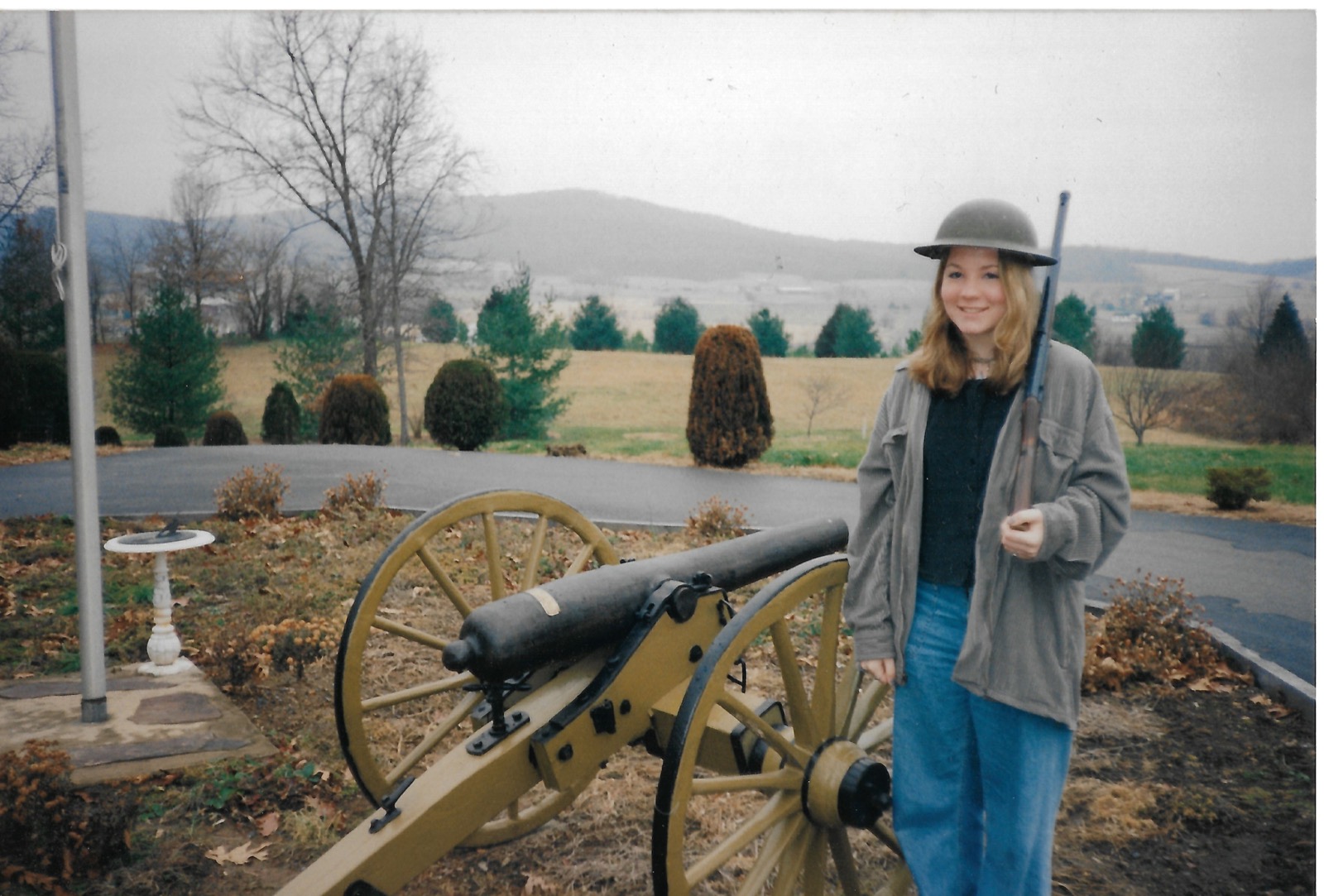Eileen beside a historic cannon