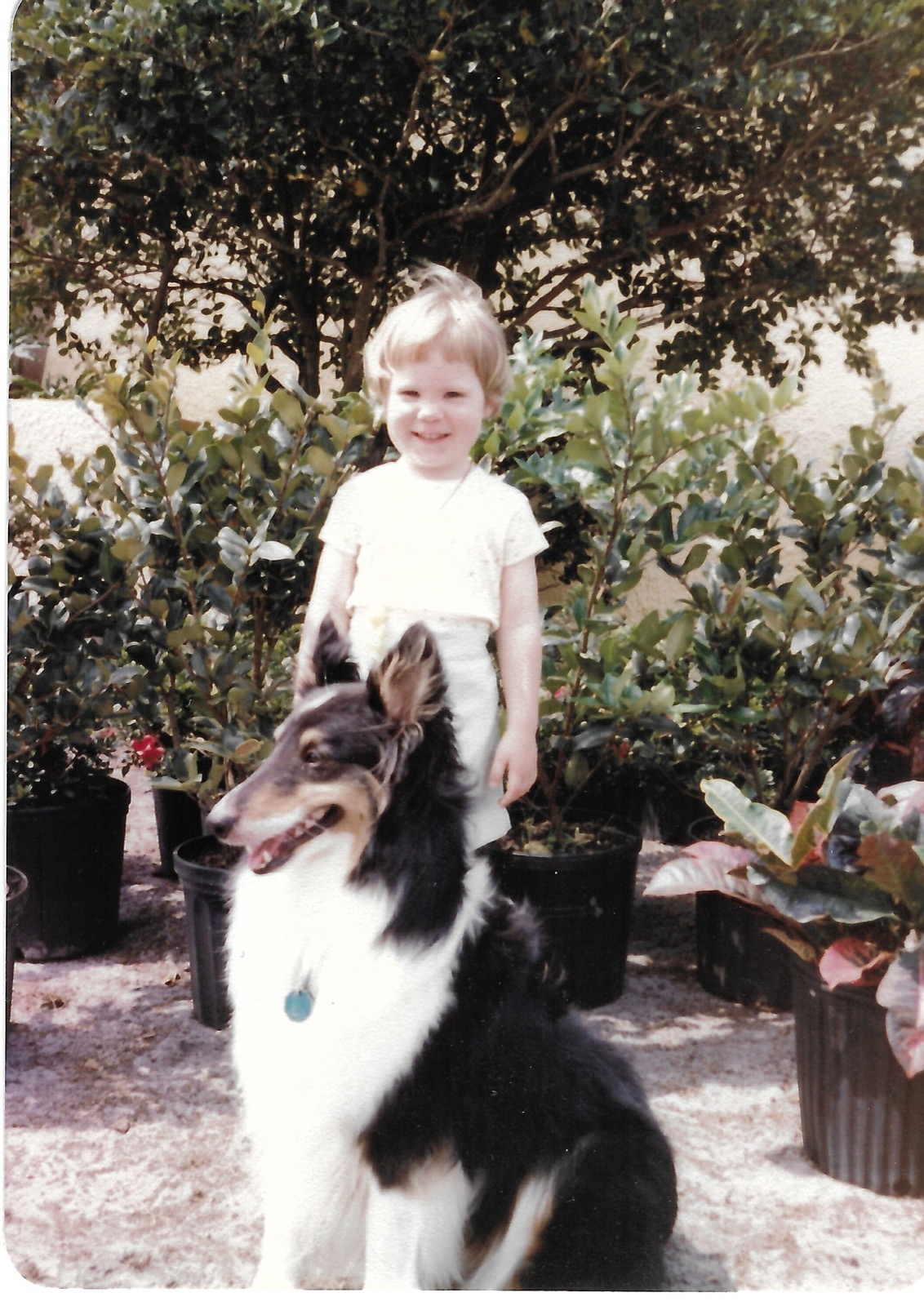 Eileen with Lance in a garden