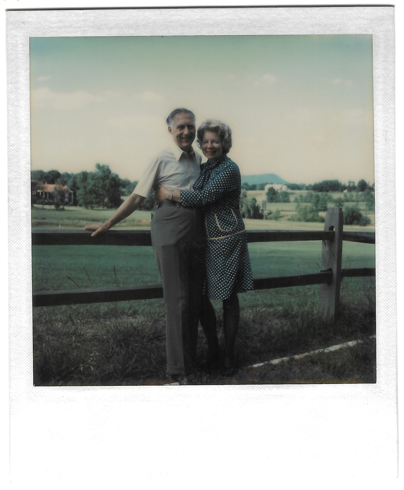 Jean and Jack by a fence
