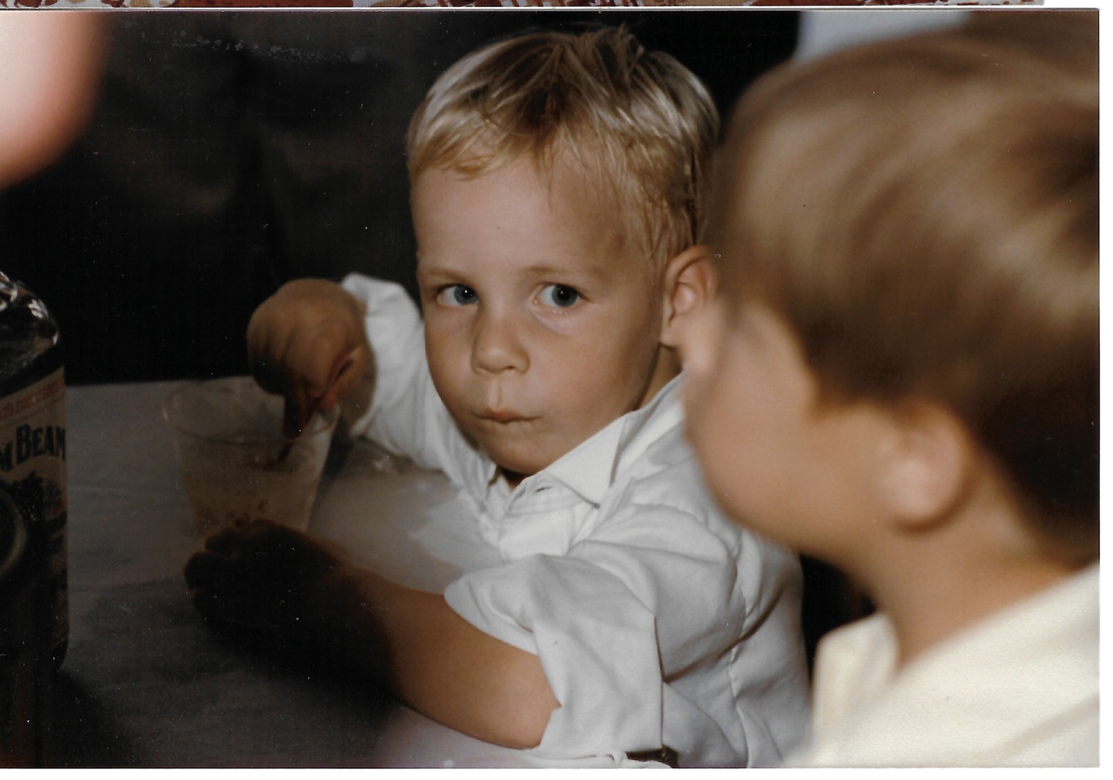 Young Dave at a table
