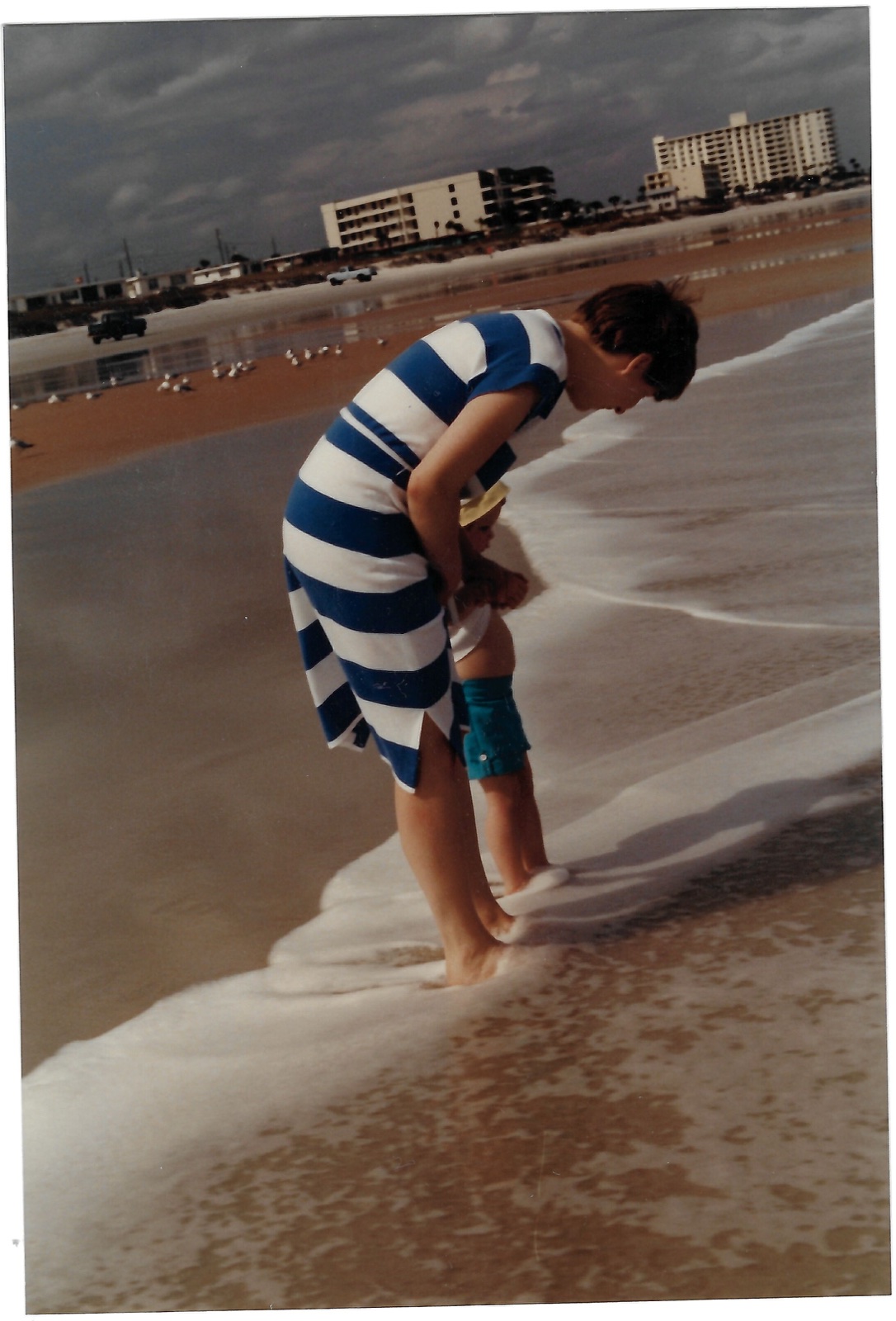 Betty and Eileen in the shallow surf in Florida, February 1982.